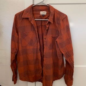 Cute orange flannel. Like new. Only wore a feee times.